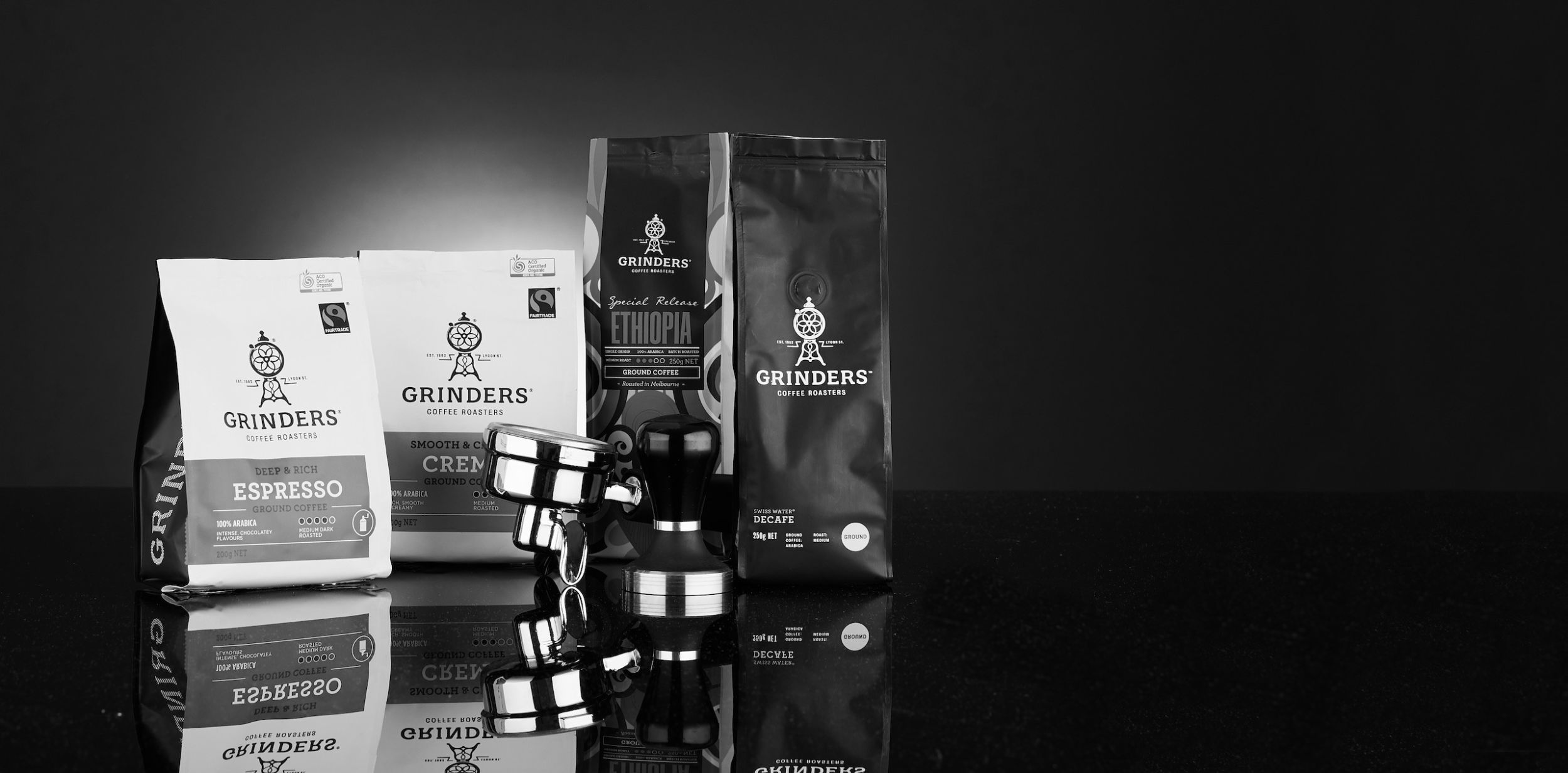 Grinders Coffee ground coffee packs in black and white 2