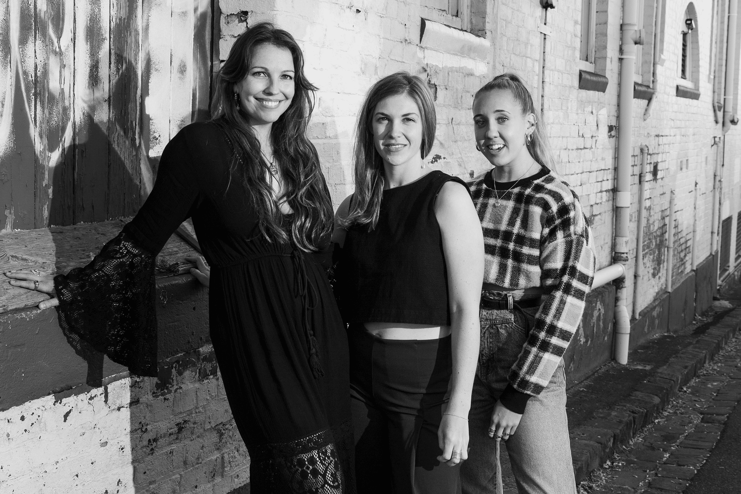 Antra, Megan and Janeva standing together